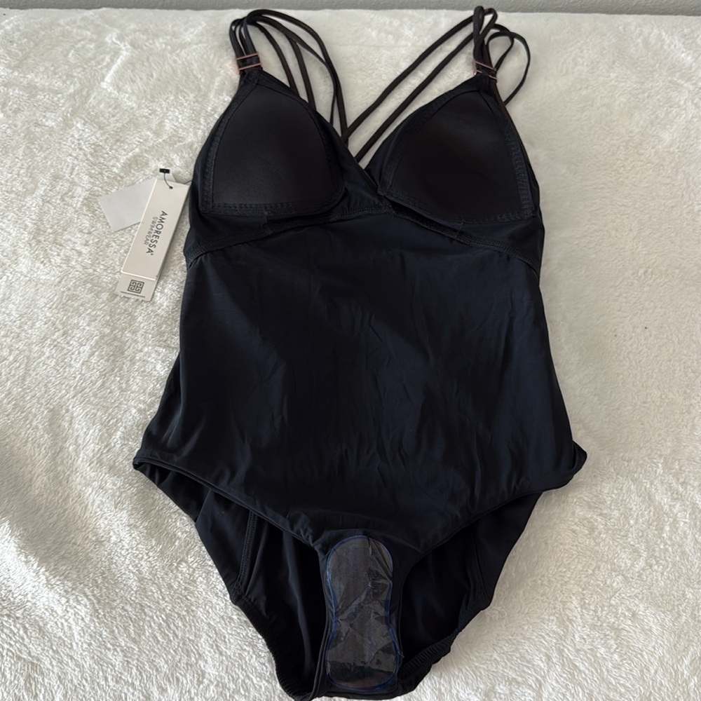 Amoressa Black and Bronze one Piece NWT Swimsuit.
Size 10. - Picture 9 of 9